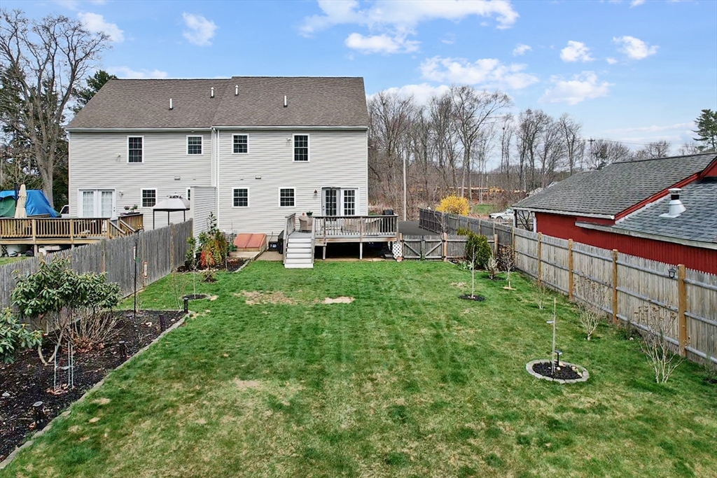 12 Pinckney Street, Unit A Taunton, MA 02780 - Photo 38 of 42 a view of house with backyard