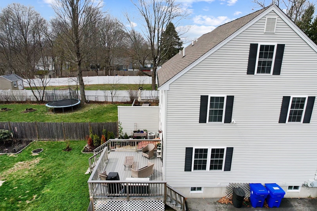 12 Pinckney Street, Unit A Taunton, MA 02780 - Photo 40 of 42 a view of a house with backyard and sitting area
