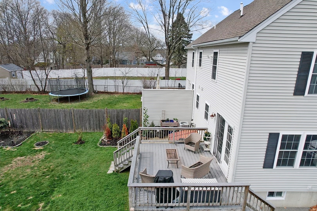 12 Pinckney Street, Unit A Taunton, MA 02780 - Photo 4 of 42 a view of a house with backyard and deck