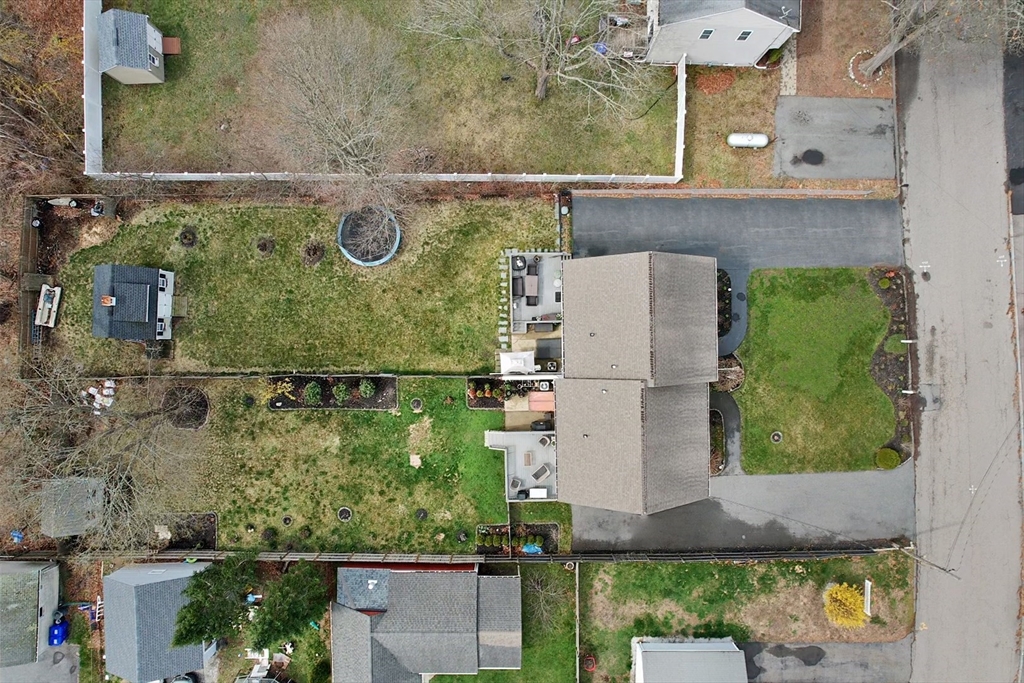 12 Pinckney Street, Unit A Taunton, MA 02780 - Photo 41 of 42 an aerial view of residential houses with outdoor space