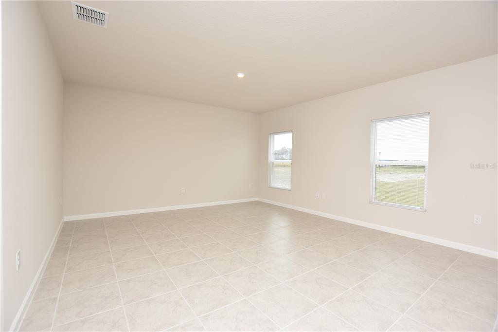 622 Manchester Path Dundee, FL 33838 - Photo 10 of 46 an empty room with windows