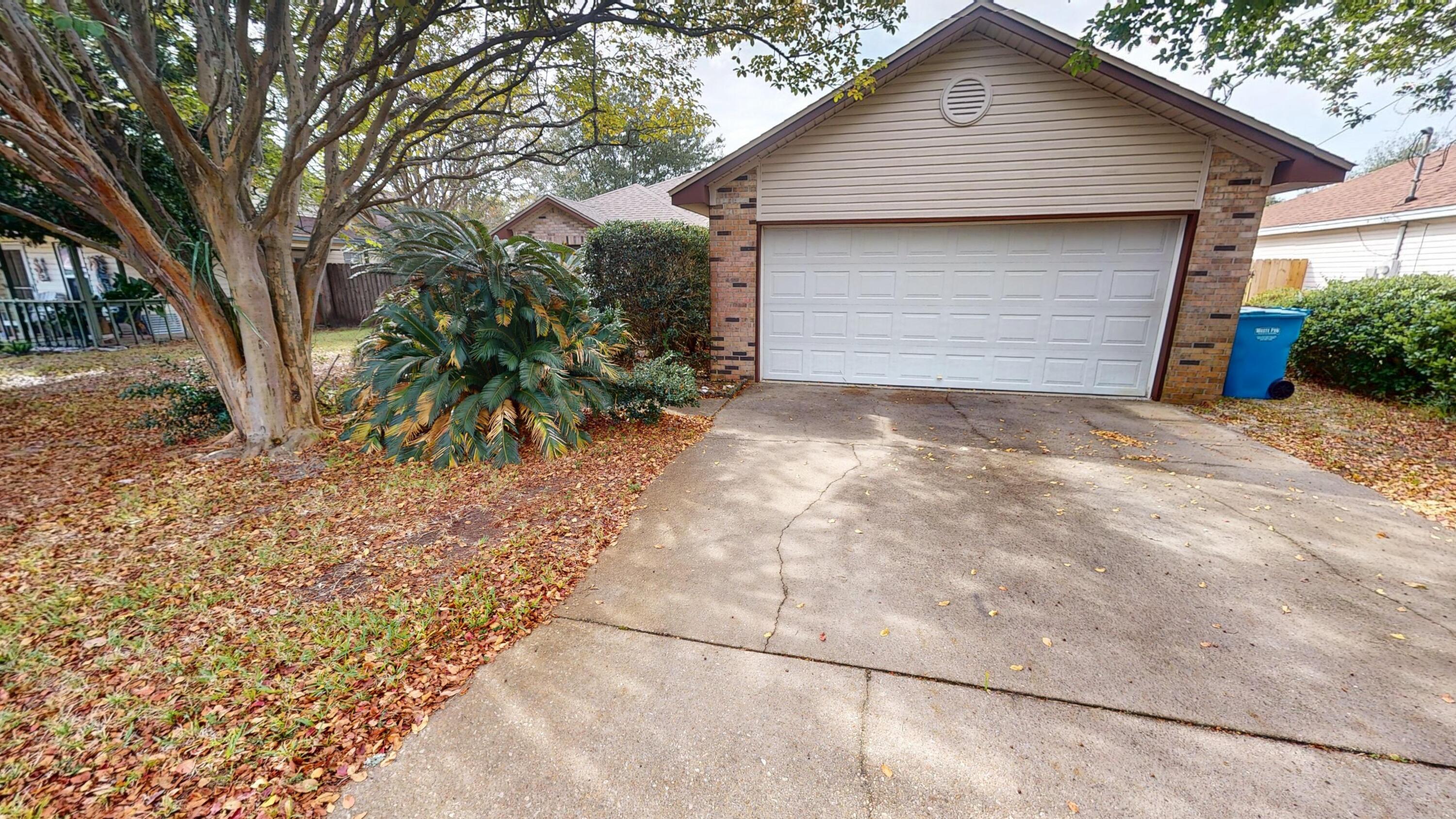 2293 Estate Circle Navarre, FL 32566 - Photo 2 of 41 a view of backyard of house
