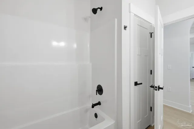 a bathroom with a bathtub