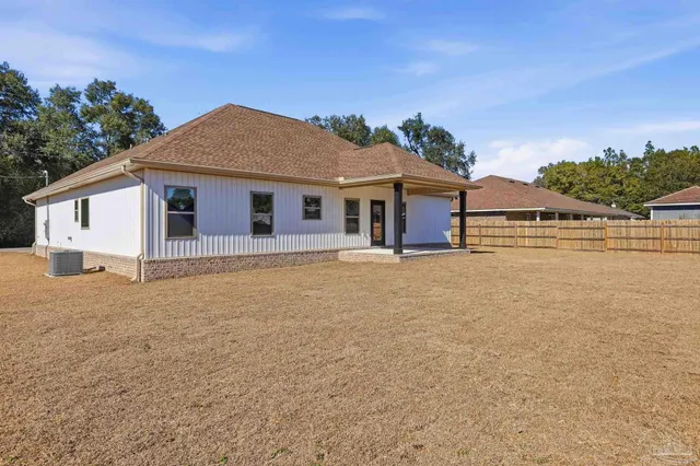 front view of a house with a patio