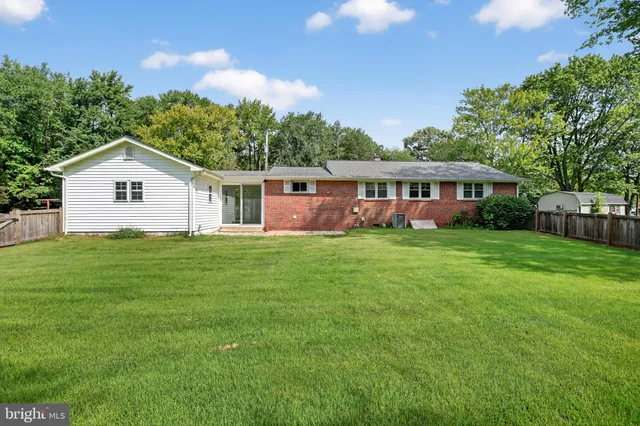 a view of a house with a big yard