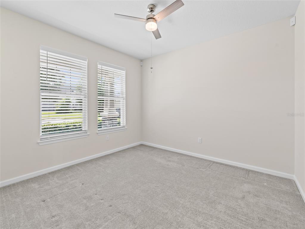 1010 Better Days Place Valrico, FL 33594 - Photo 13 of 55 an empty room with a window