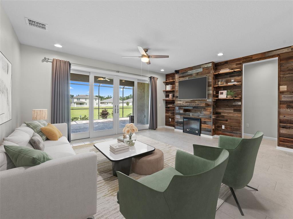 1010 Better Days Place Valrico, FL 33594 - Photo 22 of 55 a living room with furniture and a flat screen tv