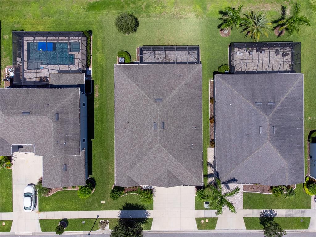 1010 Better Days Place Valrico, FL 33594 - Photo 49 of 55 an aerial view of a house with a yard
