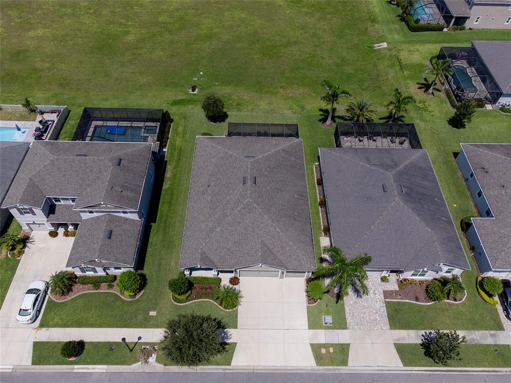 1010 Better Days Place Valrico, FL 33594 - Photo 50 of 55 an aerial view of a house with a yard
