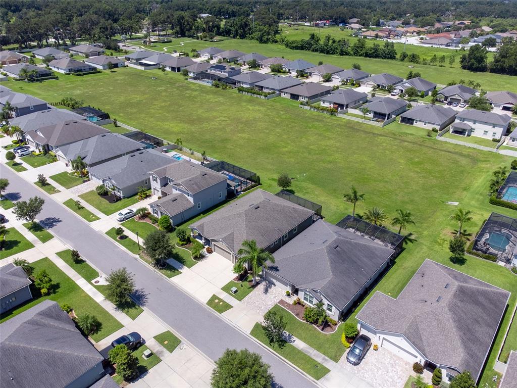 1010 Better Days Place Valrico, FL 33594 - Photo 51 of 55 an aerial view of a house with a garden