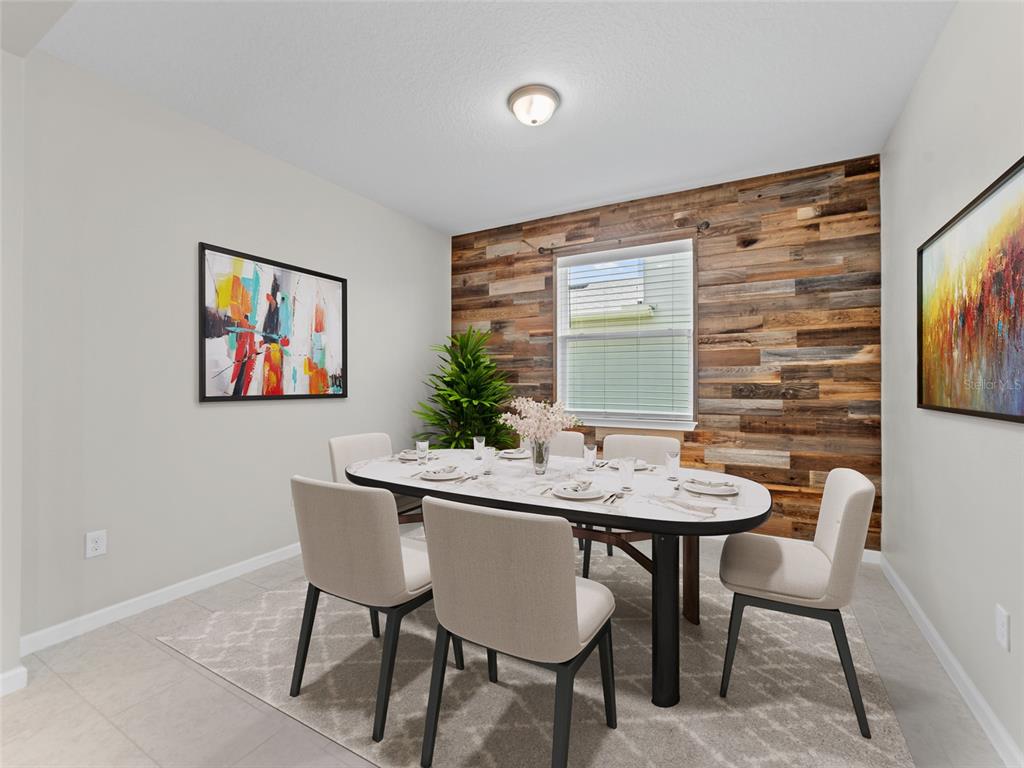 1010 Better Days Place Valrico, FL 33594 - Photo 8 of 55 a view of a dining room with furniture and window