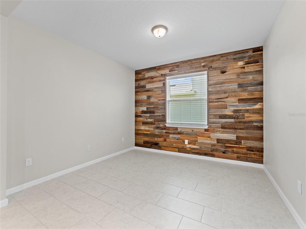 1010 Better Days Place Valrico, FL 33594 - Photo 9 of 55 a view of an empty room and window