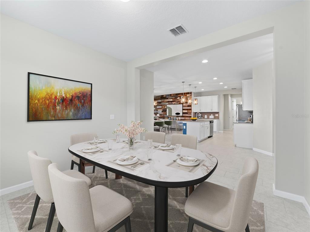 1010 Better Days Place Valrico, FL 33594 - Photo 10 of 55 a view of a dining room with furniture
