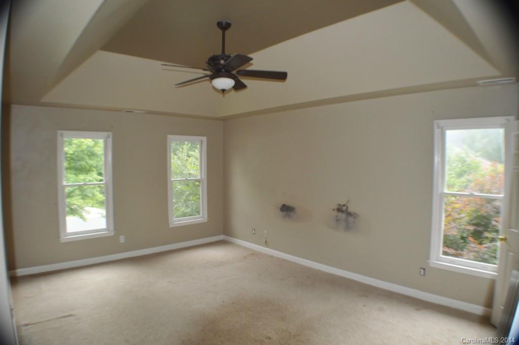 16336 Ranger Trail Huntersville, NC 28078 - Photo 9 of 12 a view of an empty room with a window