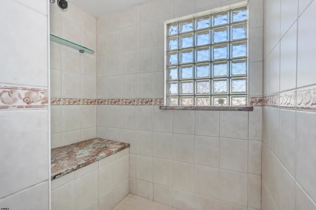 a bedroom with furniture and a wooden floor