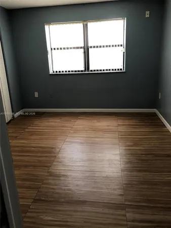 a view of a room with table and chair