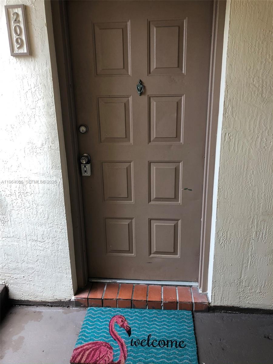 7130 Northwest 179th Street, Unit 209 Hialeah, FL 33015 - Photo 2 of 16