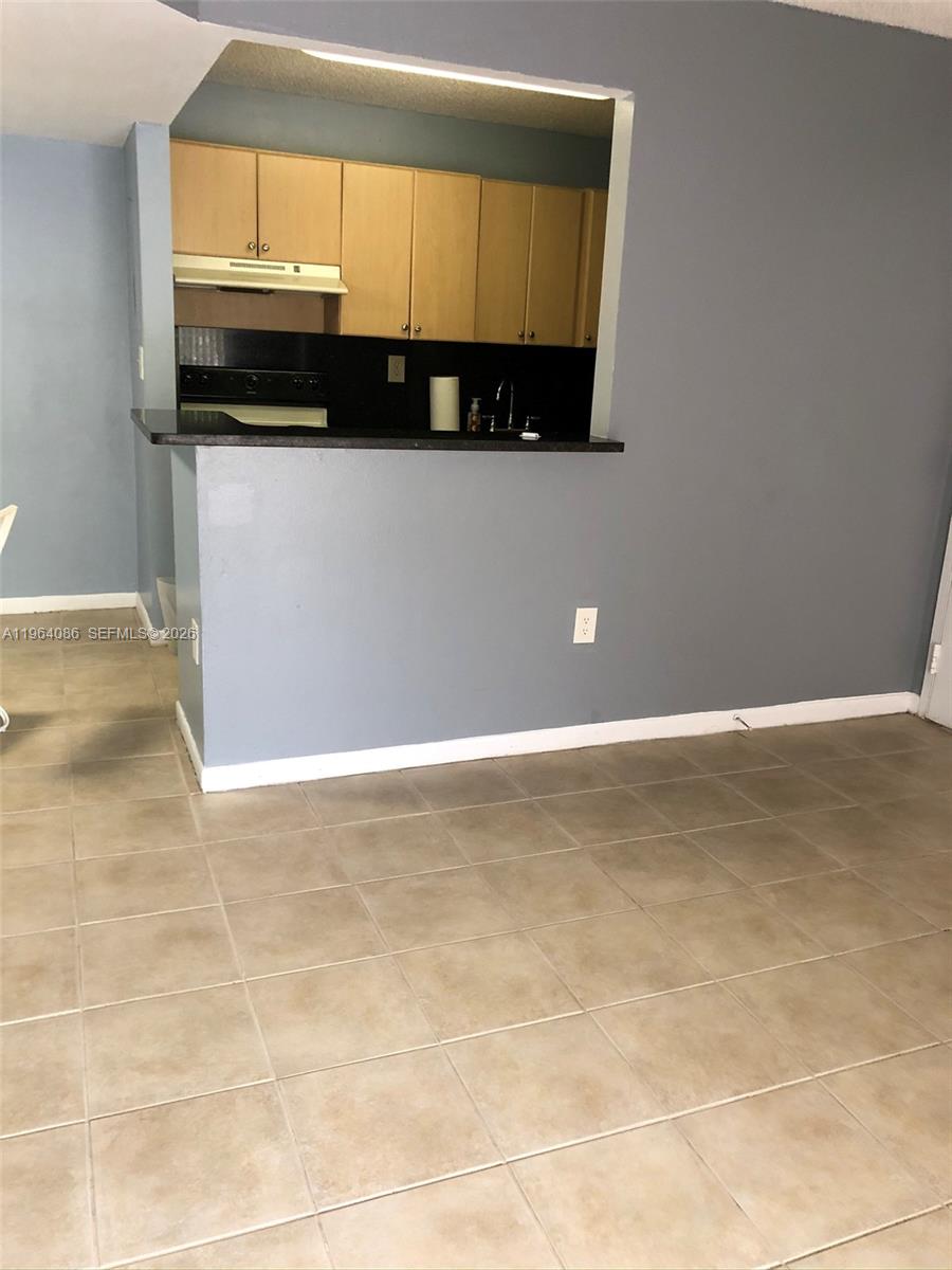 7130 Northwest 179th Street, Unit 209 Hialeah, FL 33015 - Photo 5 of 16