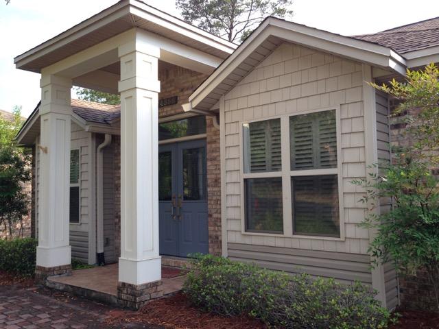 4556 Redbud Trail Niceville, FL 32578 - Photo 2 of 41 a front view of a house with a yard