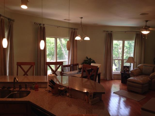4556 Redbud Trail Niceville, FL 32578 - Photo 14 of 41 a living room with furniture and a large window