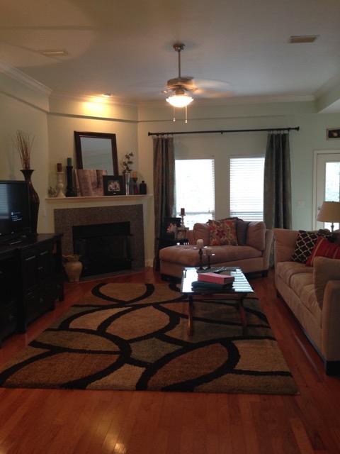 4556 Redbud Trail Niceville, FL 32578 - Photo 15 of 41 a living room with furniture and a fireplace