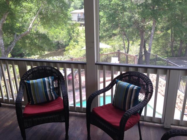 4556 Redbud Trail Niceville, FL 32578 - Photo 18 of 41 a view of balcony with furniture and outdoor space