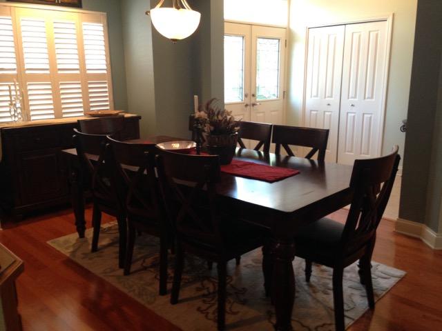 4556 Redbud Trail Niceville, FL 32578 - Photo 19 of 41 a view of a dining room with furniture and window