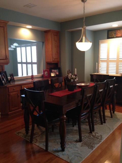 4556 Redbud Trail Niceville, FL 32578 - Photo 20 of 41 a view of a dining room with furniture window and wooden floor