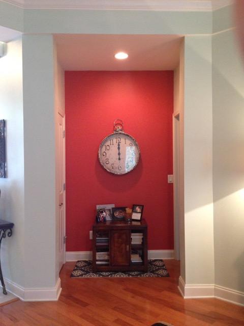 4556 Redbud Trail Niceville, FL 32578 - Photo 4 of 41 a view of a hallway with wooden floor