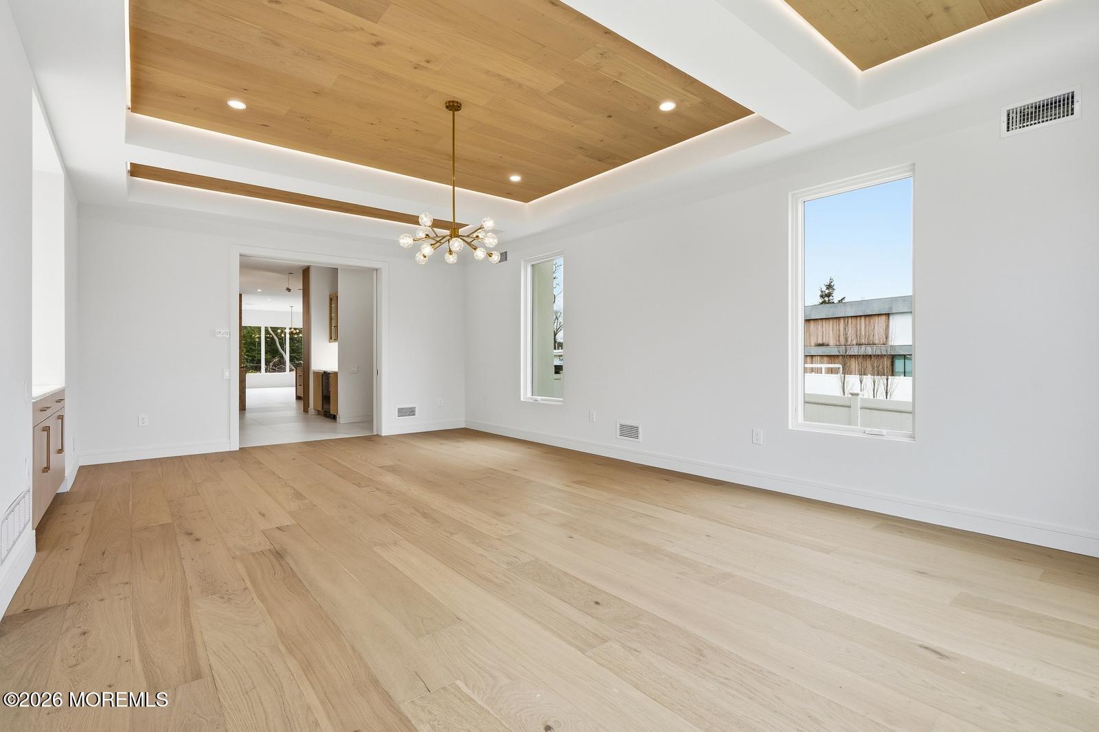44 Whalepond Road Oakhurst, NJ 07755 - Photo 13 of 16 a view of a chandelier in big room and chandelier