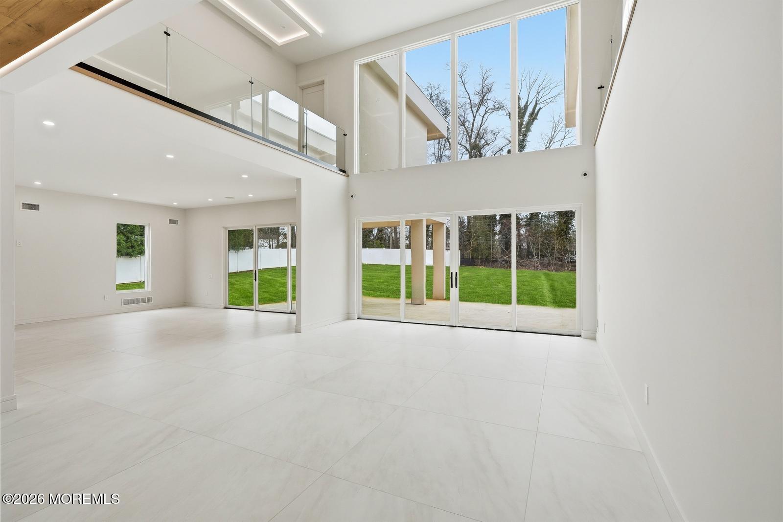 44 Whalepond Road Oakhurst, NJ 07755 - Photo 5 of 16 a view of an empty room with a window