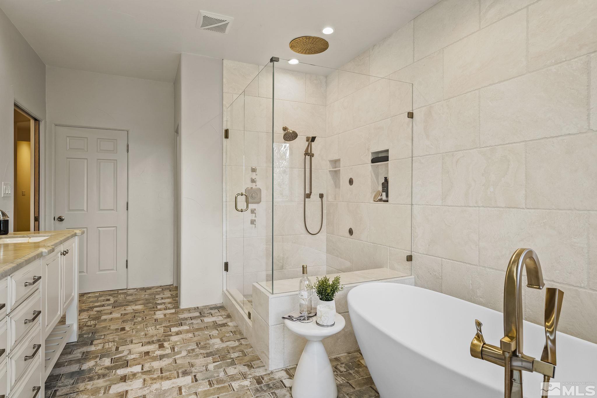 15 Promontory Pointe Reno, NV 89519 - Photo 19 of 40 a bathroom with a sink a toilet and a shower