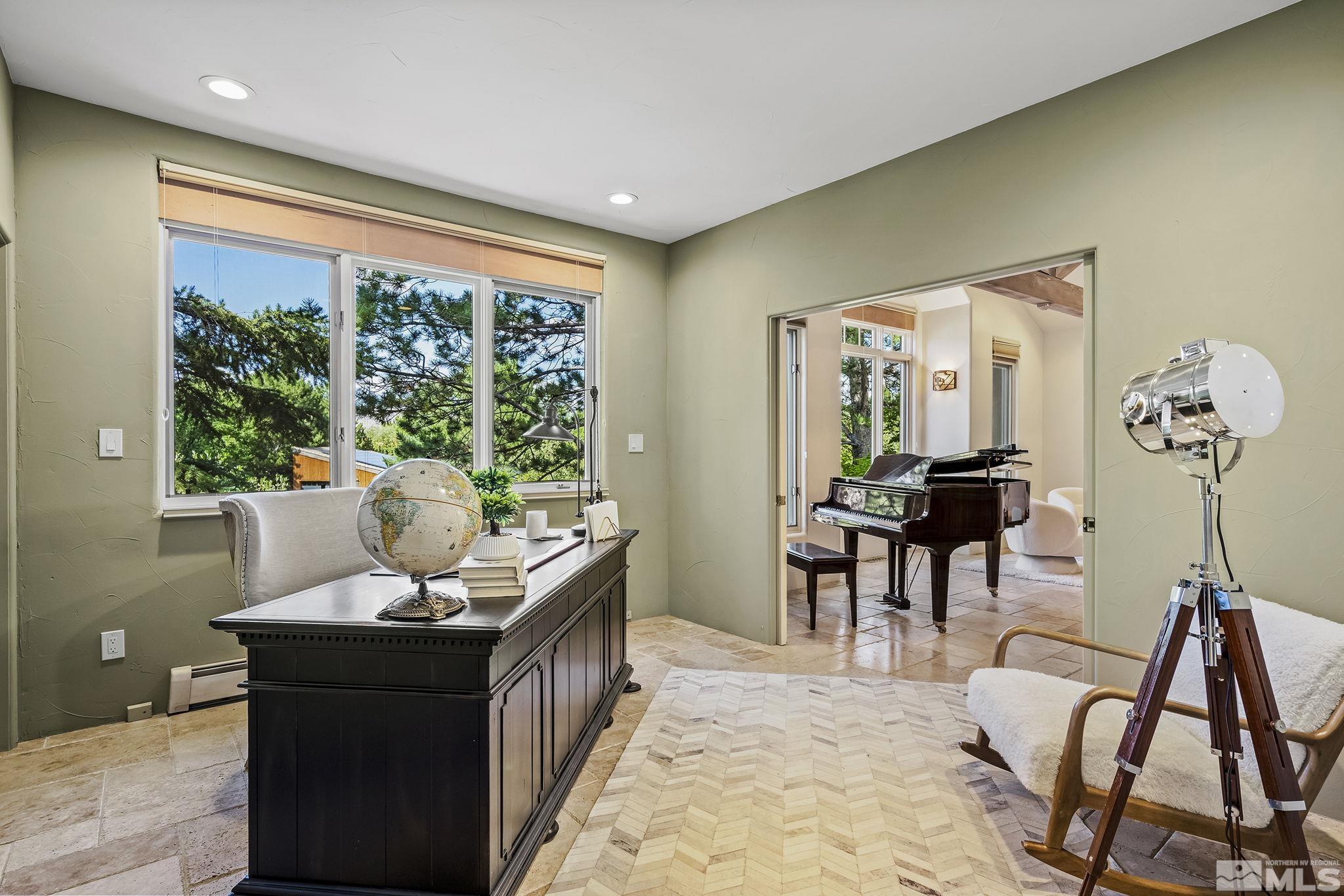 15 Promontory Pointe Reno, NV 89519 - Photo 24 of 40 a living room with furniture and a large window
