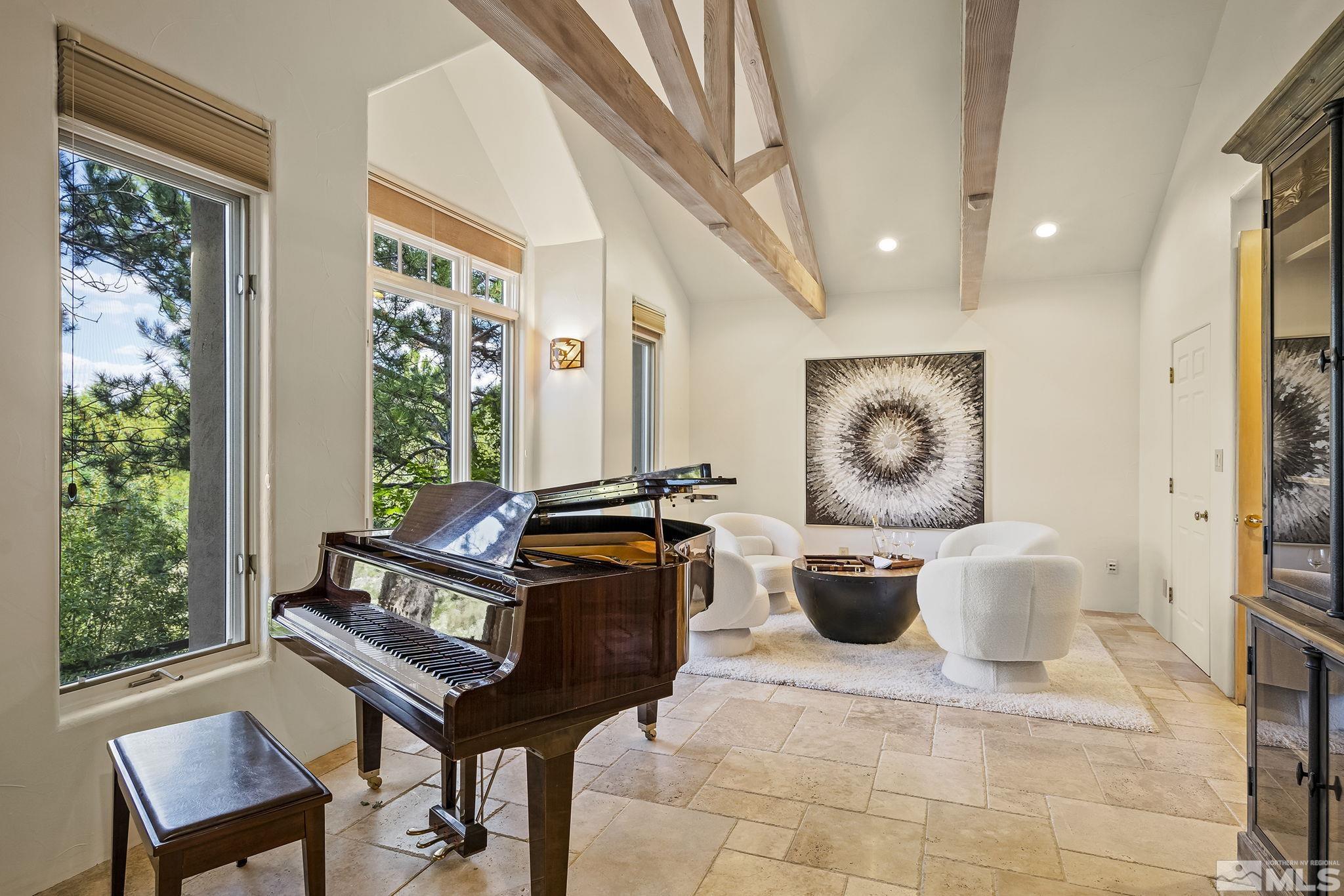15 Promontory Pointe Reno, NV 89519 - Photo 25 of 40 a living room with furniture and a large window
