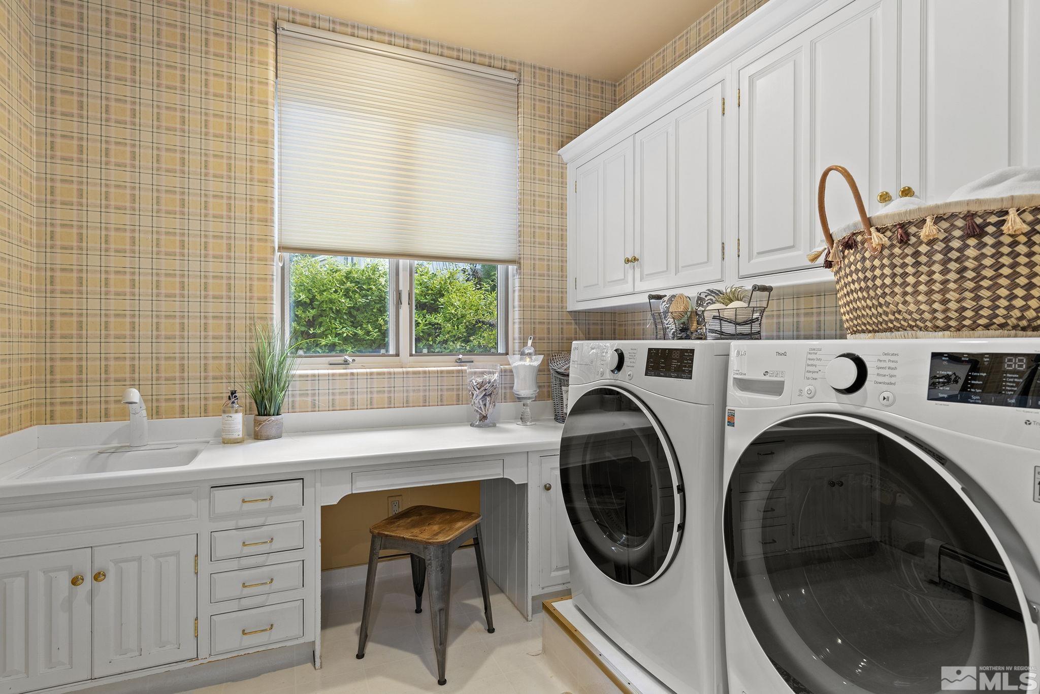 15 Promontory Pointe Reno, NV 89519 - Photo 29 of 40 a utility room with sink dryer and washer