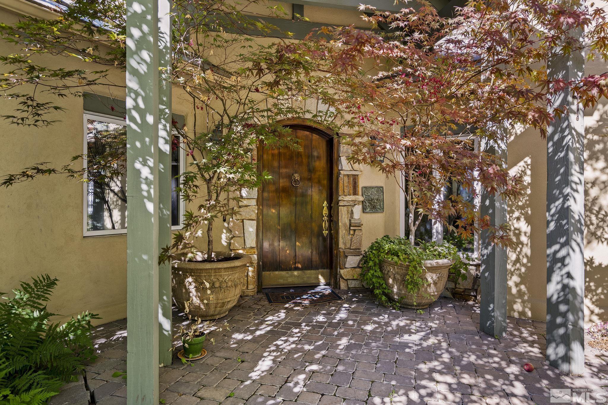 15 Promontory Pointe Reno, NV 89519 - Photo 3 of 40 a pathway with a yard