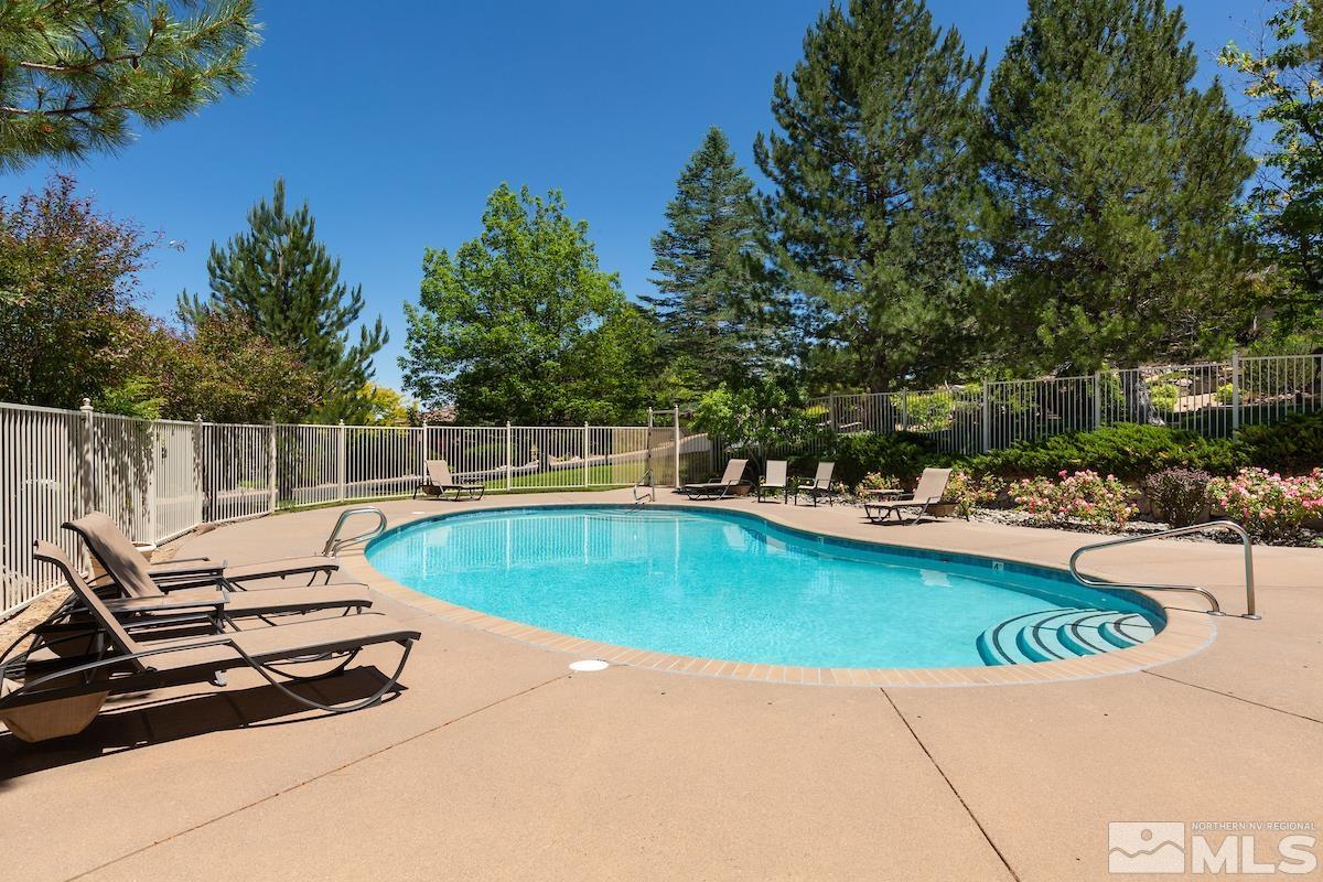 15 Promontory Pointe Reno, NV 89519 - Photo 37 of 40 a view of a swimming pool with chairs