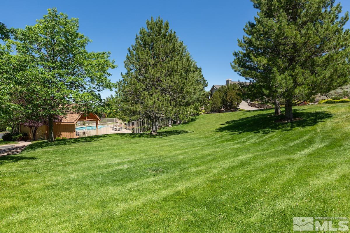 15 Promontory Pointe Reno, NV 89519 - Photo 38 of 40 a front view of a house with a yard