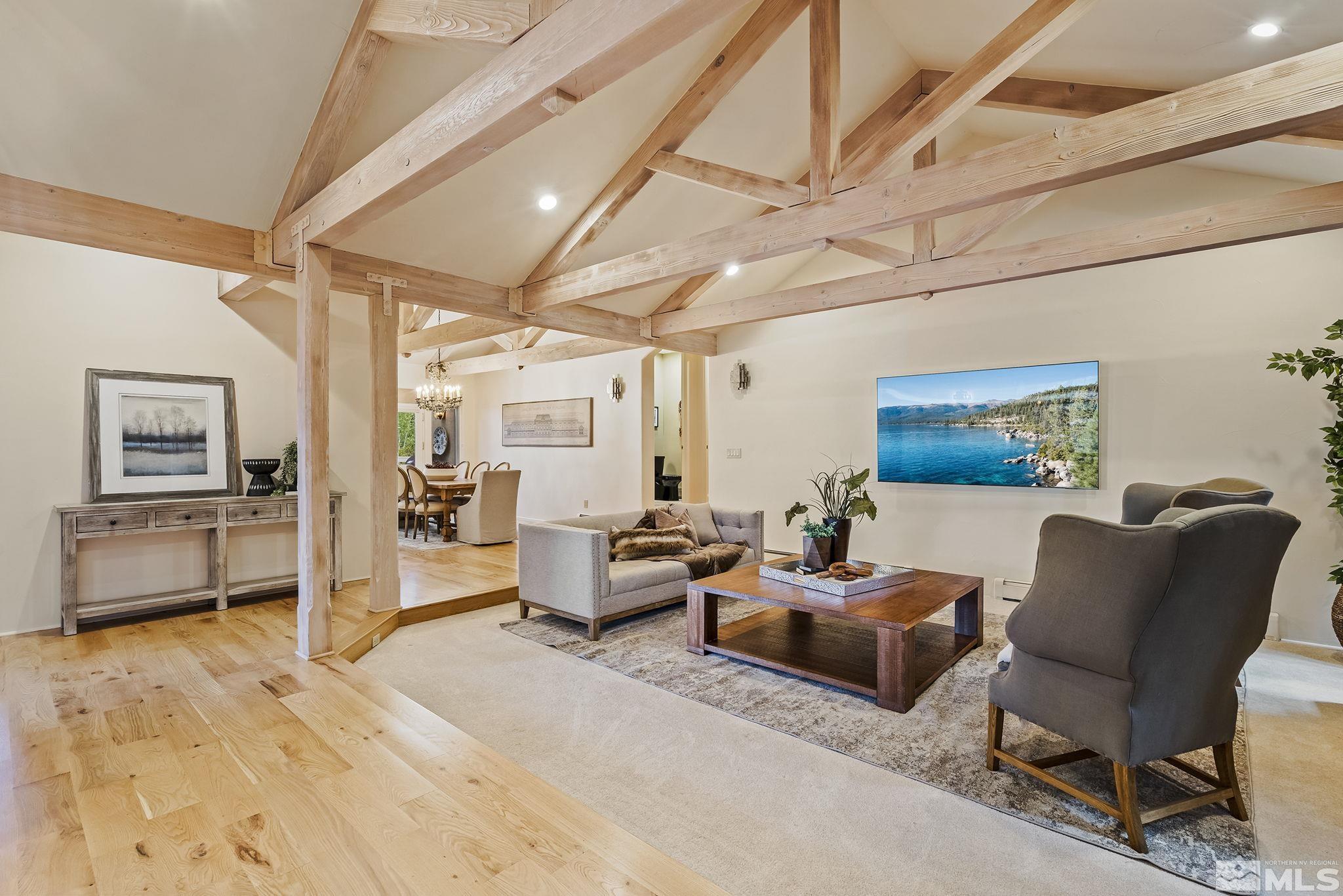 15 Promontory Pointe Reno, NV 89519 - Photo 4 of 40 a living room with furniture and a wooden floor
