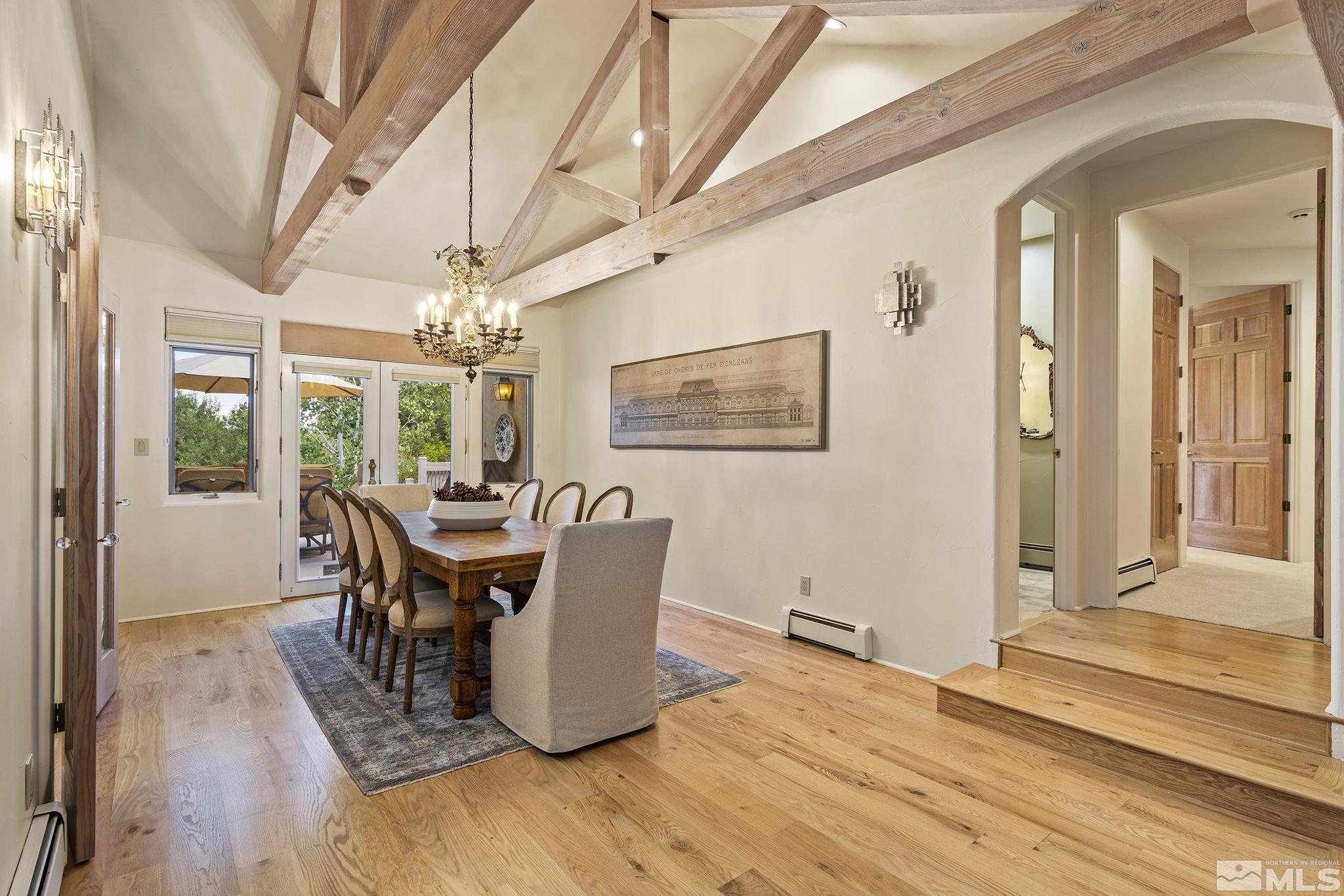 15 Promontory Pointe Reno, NV 89519 - Photo 7 of 40 a view of a dining room with furniture window and wooden floor