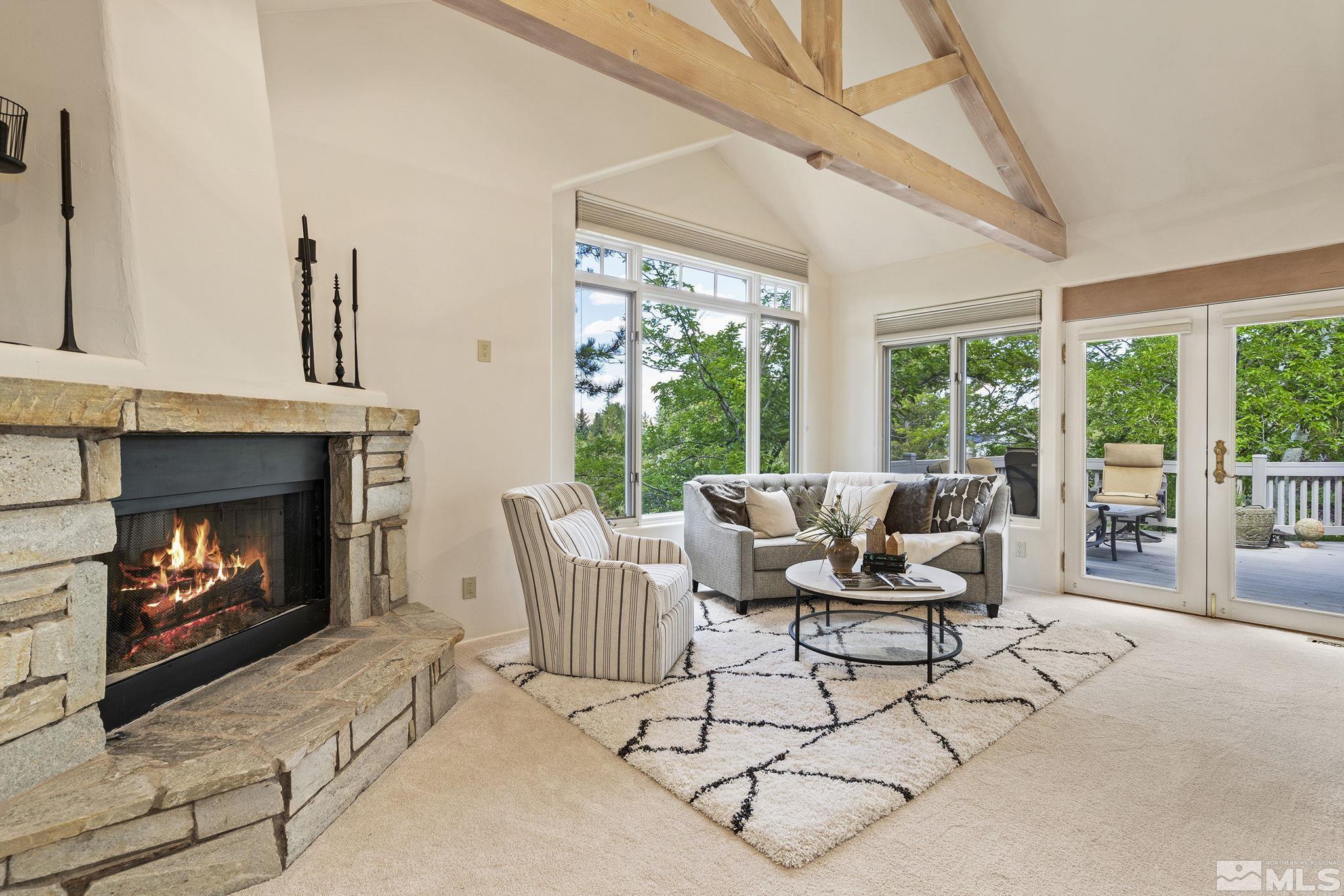 15 Promontory Pointe Reno, NV 89519 - Photo 9 of 40 a living room with furniture and a fireplace