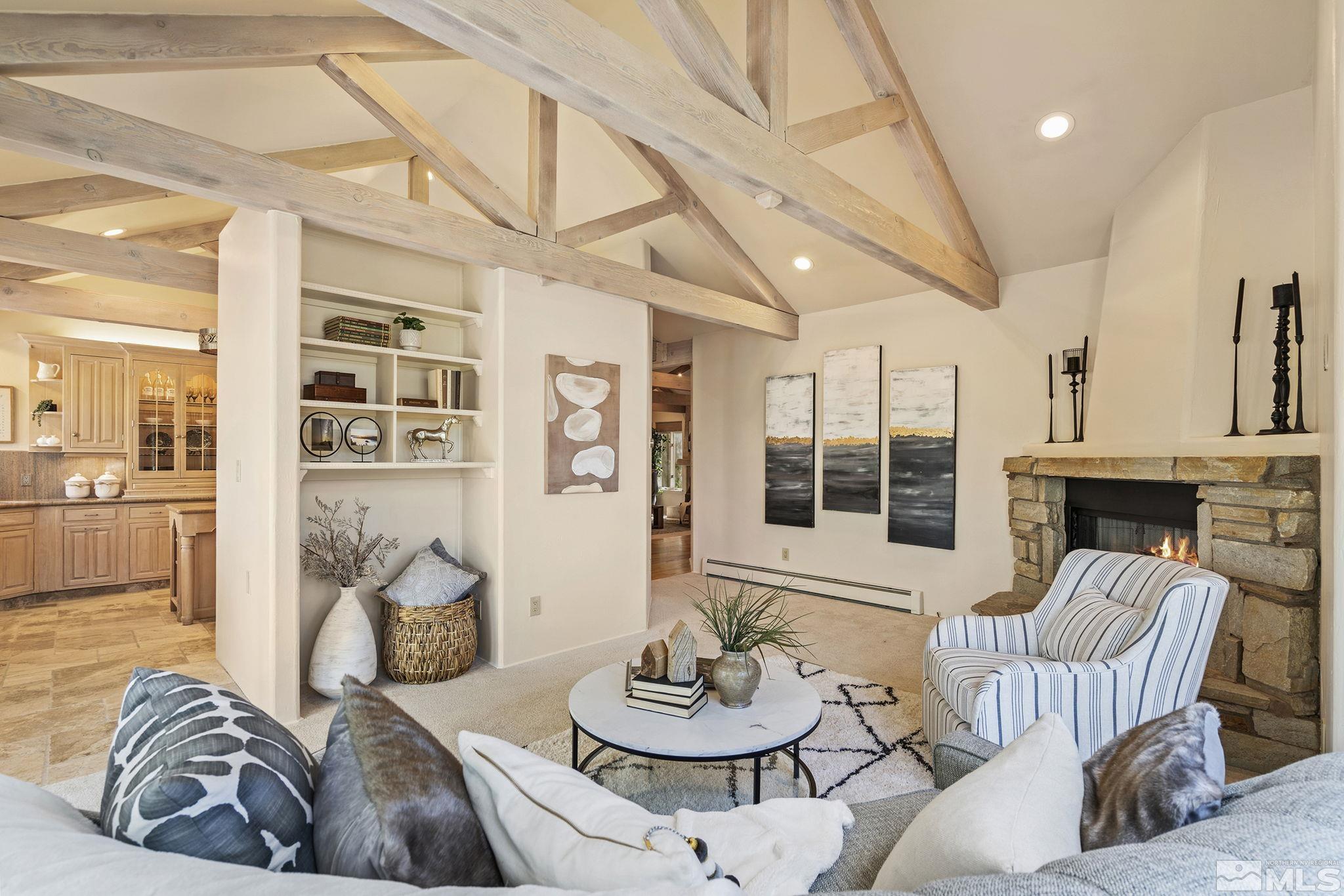 15 Promontory Pointe Reno, NV 89519 - Photo 10 of 40 a living room with furniture and a fireplace