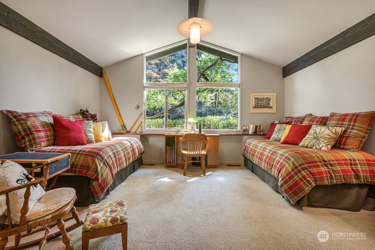 234 Middlefield Road Bellingham, WA 98225 - Photo 25 of 36 a bedroom with a bed and a couch