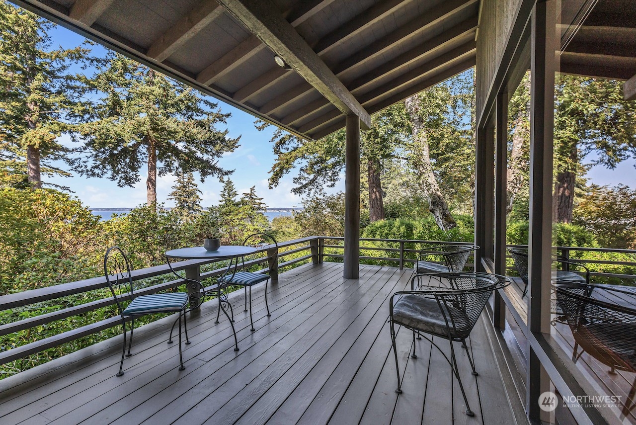 234 Middlefield Road Bellingham, WA 98225 - Photo 3 of 36 a view of a chairs and table on the wooden deck