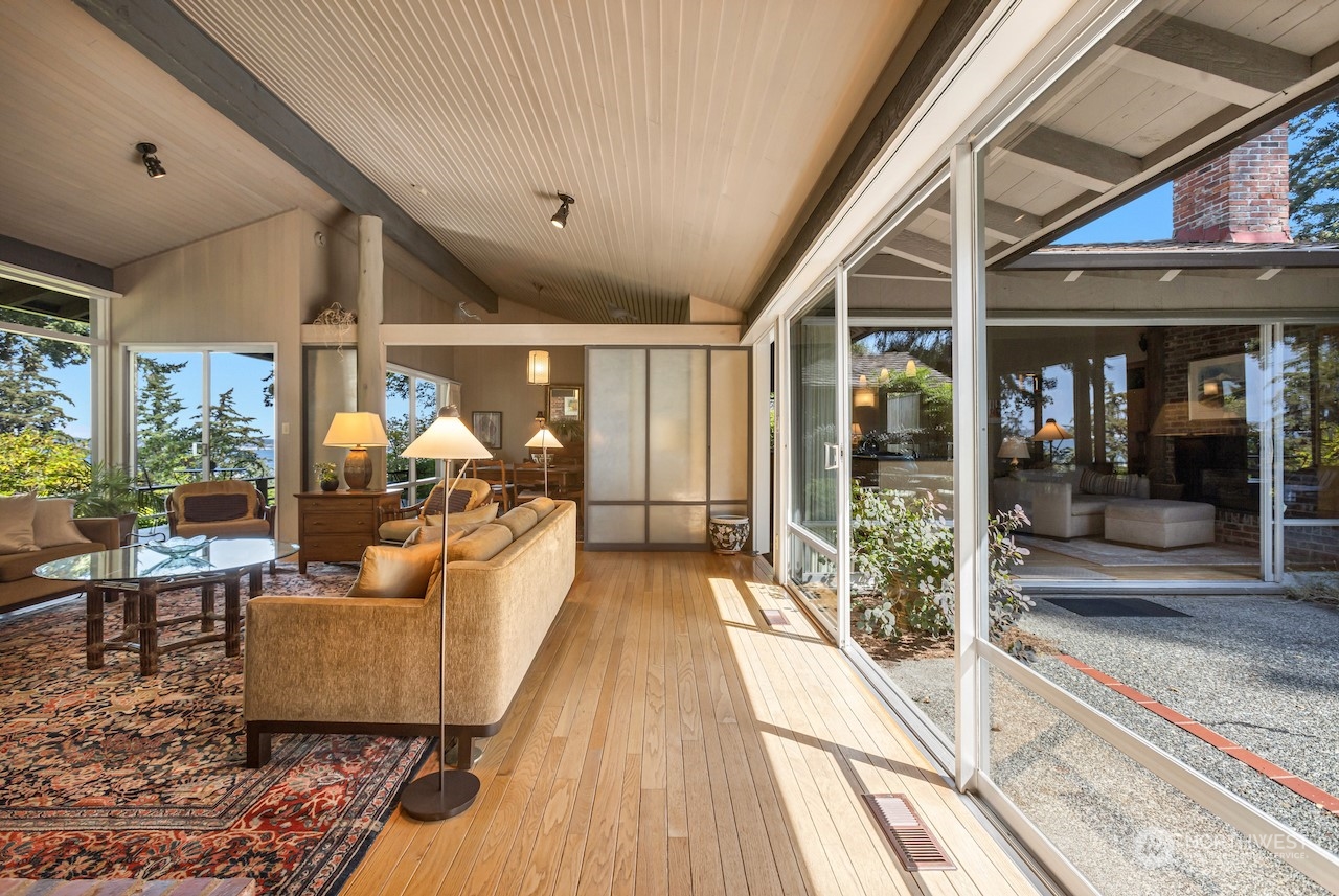 234 Middlefield Road Bellingham, WA 98225 - Photo 5 of 36 a living room with furniture and a floor to ceiling window