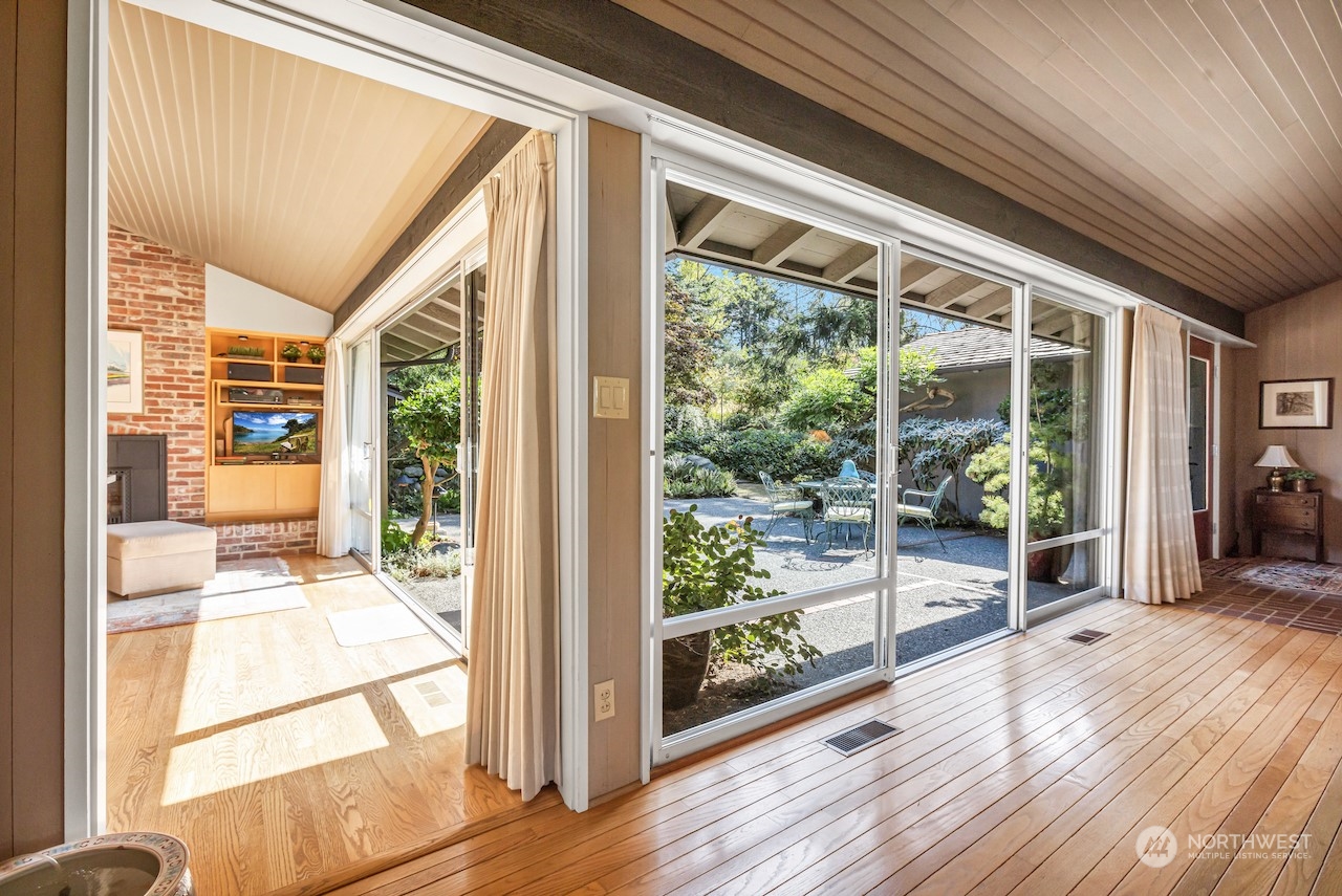 234 Middlefield Road Bellingham, WA 98225 - Photo 8 of 36 a view of a room with wooden floor and windows