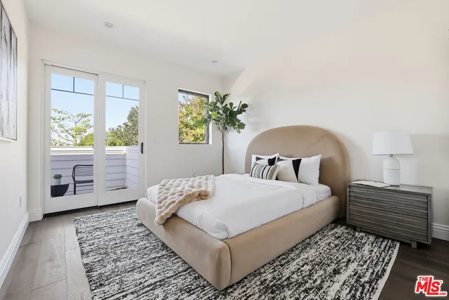 a house view with a sitting space and garden