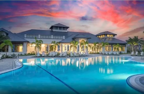 a view of a hallway with paintings on the wall