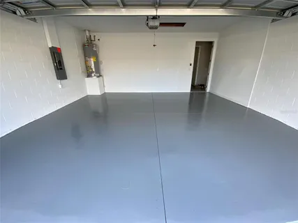 an aerial view of a house with a ocean view