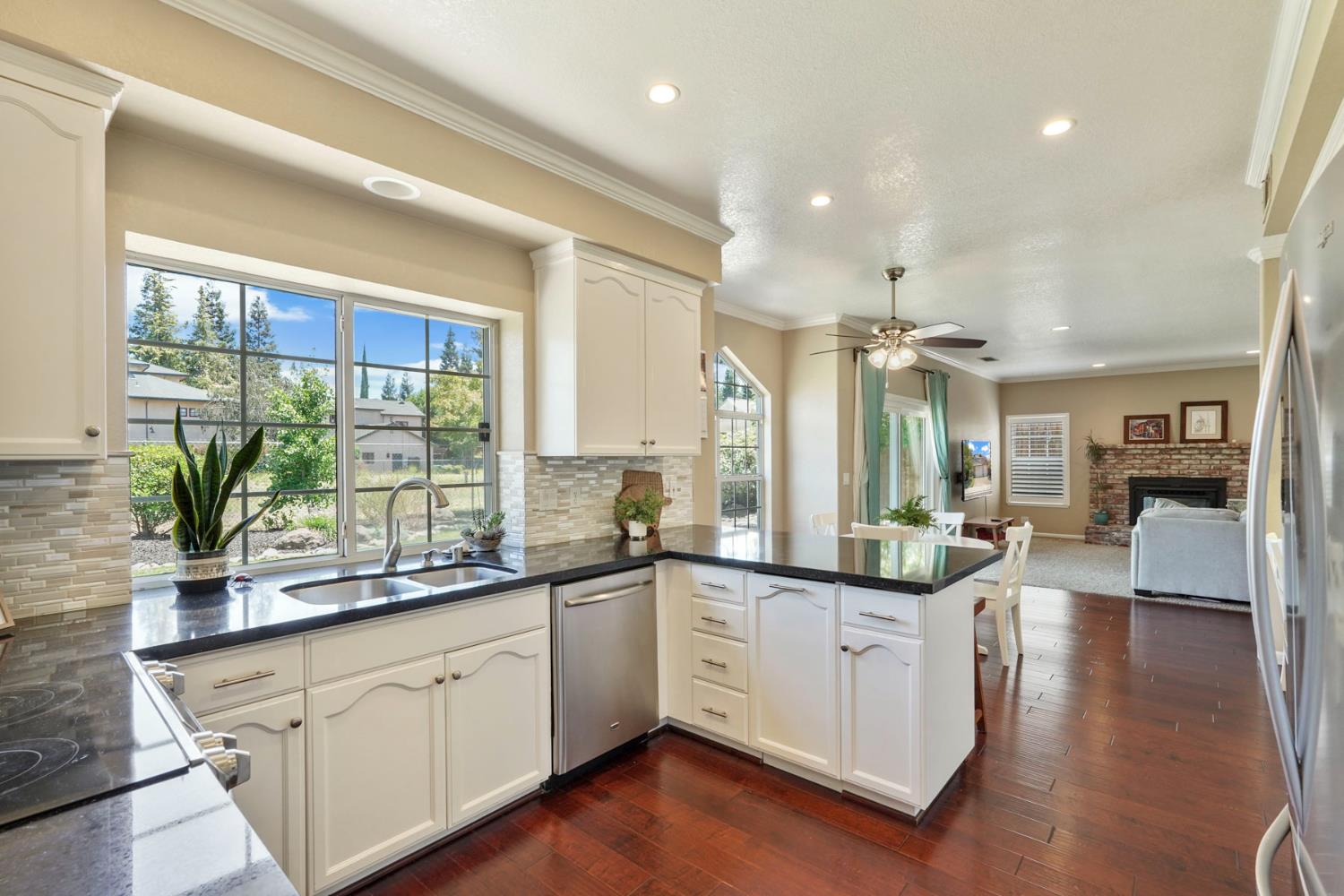 18432 Ironstone Street Woodbridge, CA 95258 - Photo 13 of 50 Updated kitchen with painted cabinetry, quartz countertops and newer appliances.